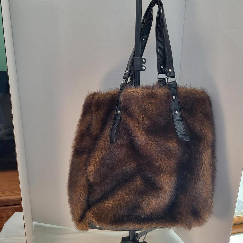 K.I.T  faux fur brown handbag with Flax black leather straps with hot pink snap